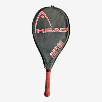 Tennis racket from Agassi Pirate 60 with its cover