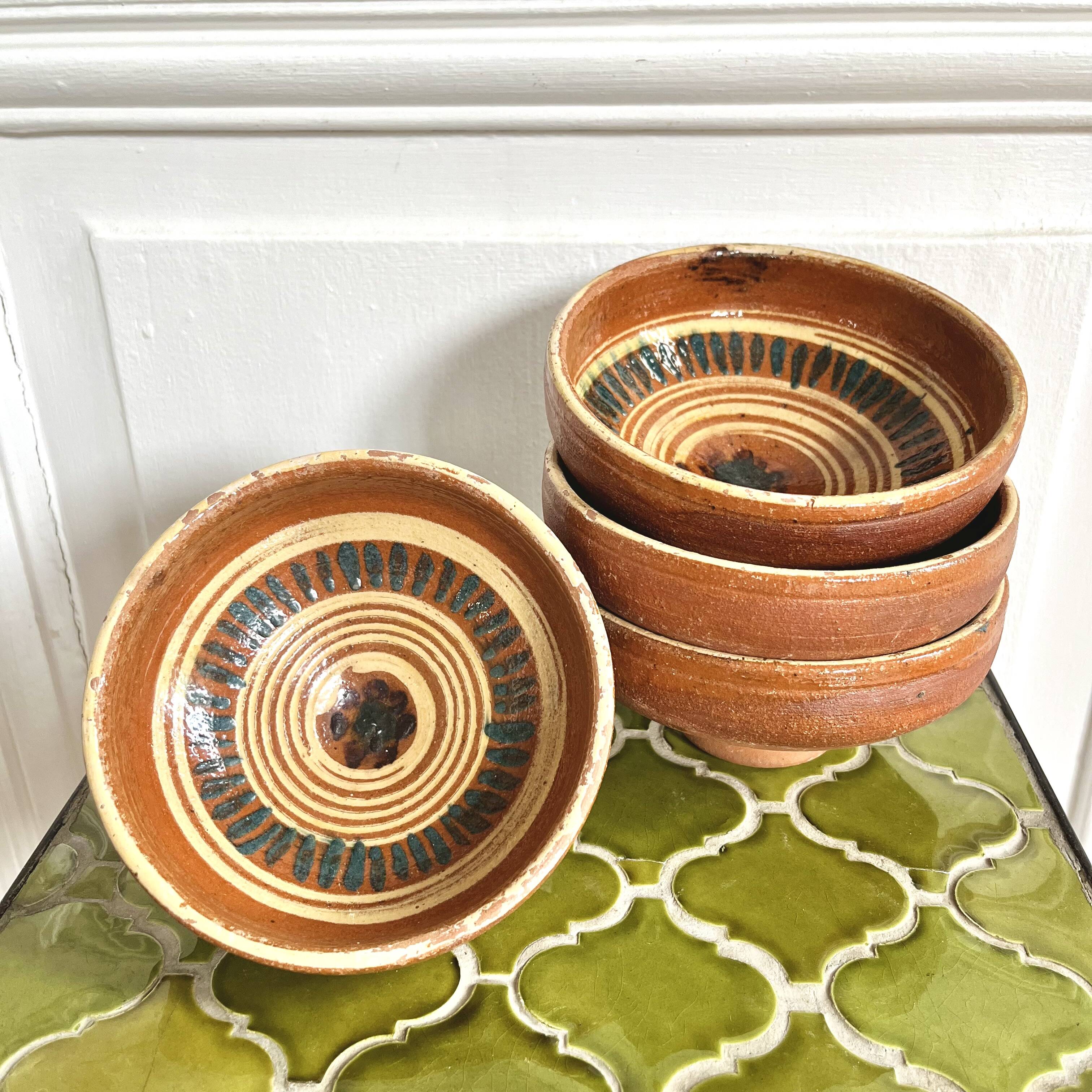 4 old handcrafted pottery bowls