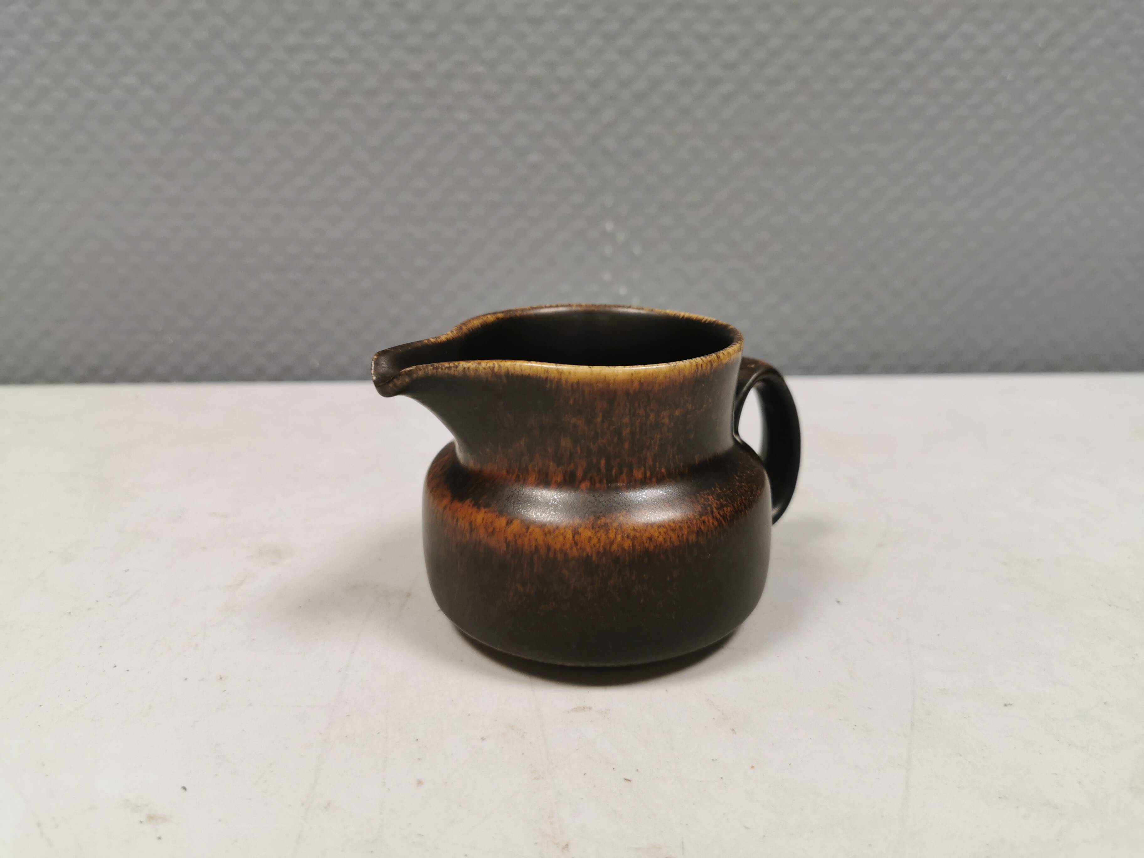 Very nice cream jug in hare fur glaze, Danish and from the 1970-80s.