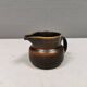 Very nice cream jug in hare fur glaze, Danish and from the 1970-80s.