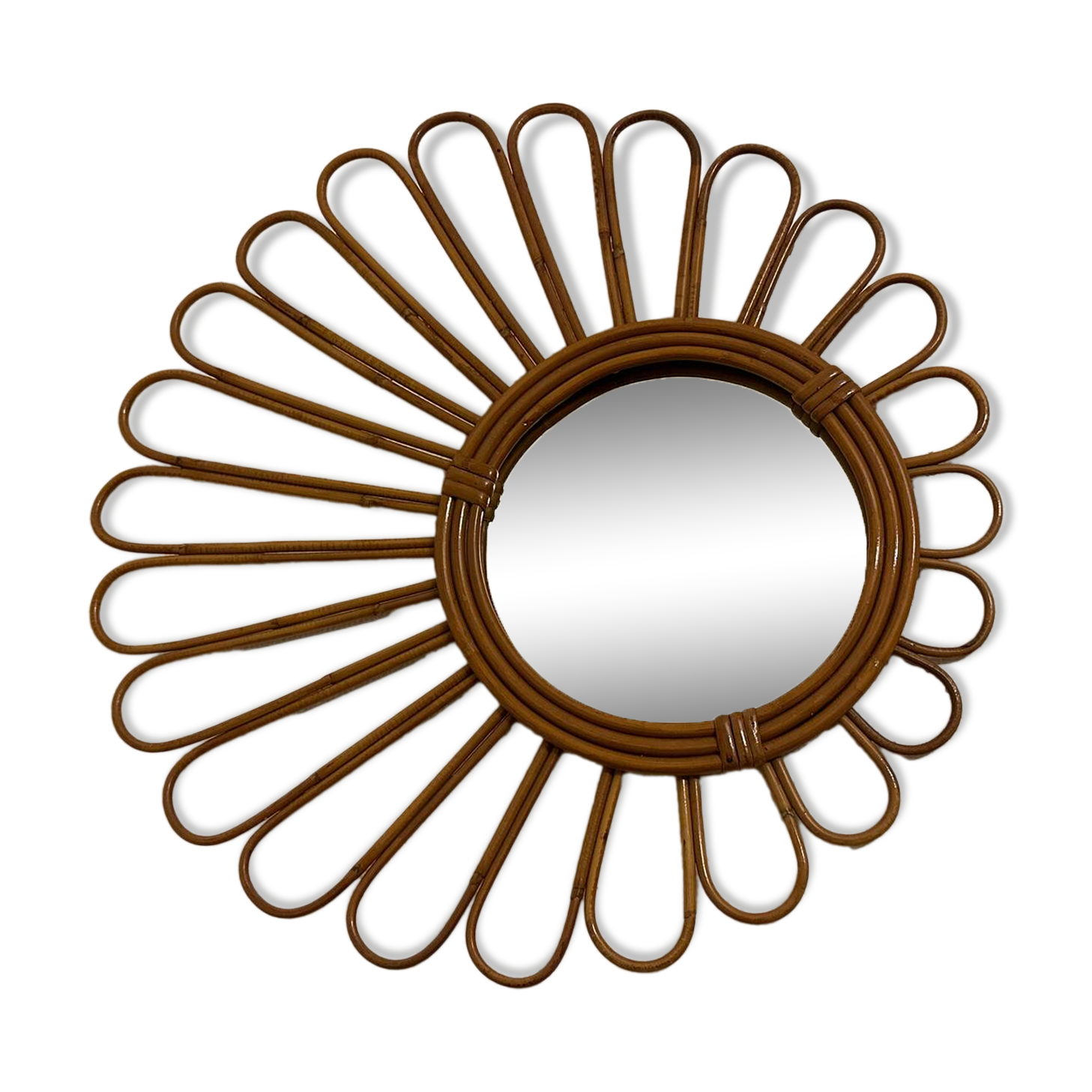 Old vintage asymmetrical round rattan mirror