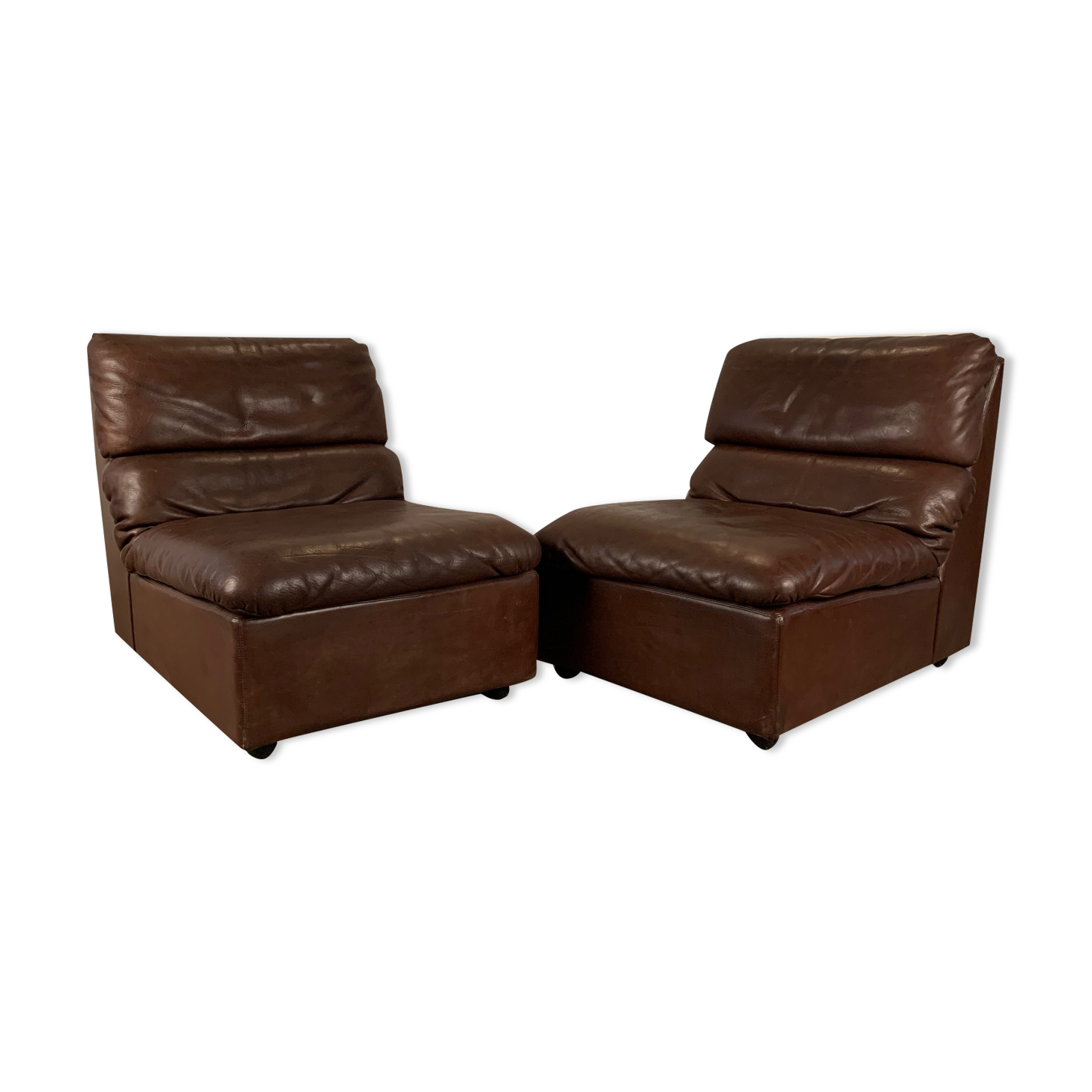 A pair of leather armchairs, Switzerland, 1970s