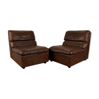 A pair of leather armchairs, Switzerland, 1970s