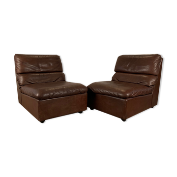 A pair of leather armchairs, Switzerland, 1970s