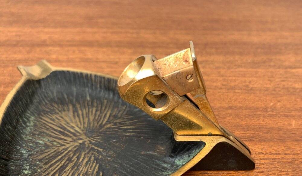 German brass ashtray with cigar cutter, 1950s.