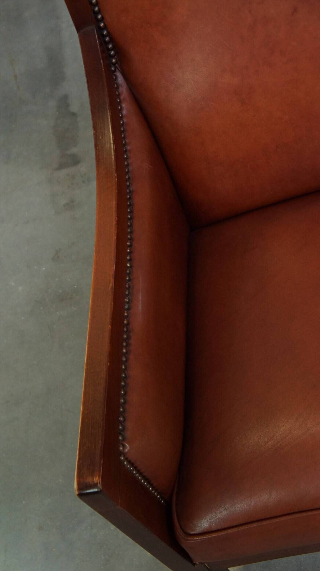Majestic, luxurious set of 2 cognac-colored cowhide leather Art Deco design armchairs