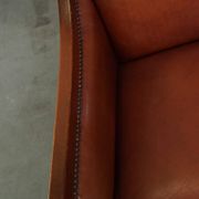 Majestic, luxurious set of 2 cognac-colored cowhide leather Art Deco design armchairs