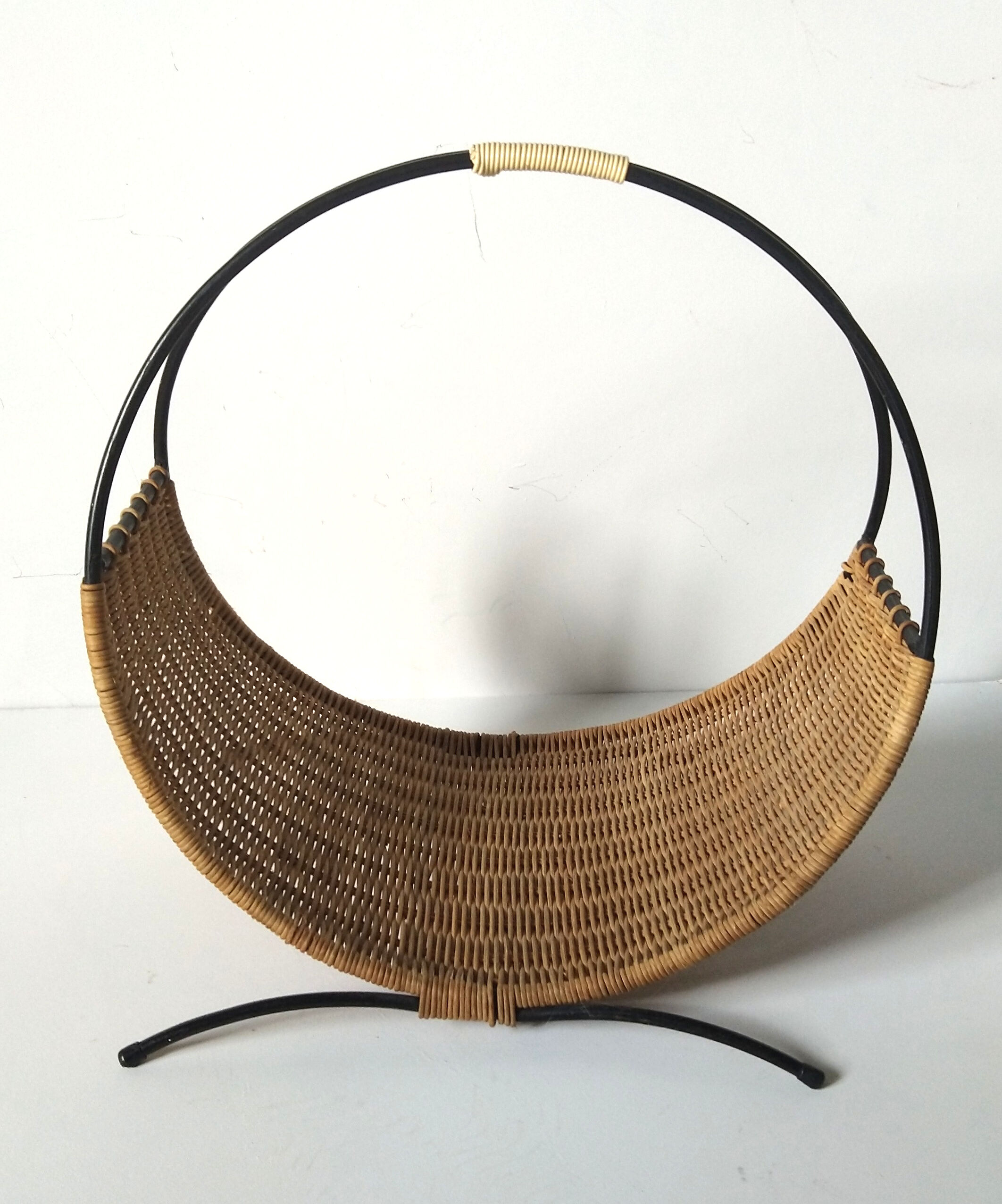 Rattan basket with logs
