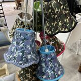 Lampshades in suspension in multicolored fabric