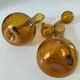 Duo of blown glass carafes – Biot signed – Bubbled amber glass