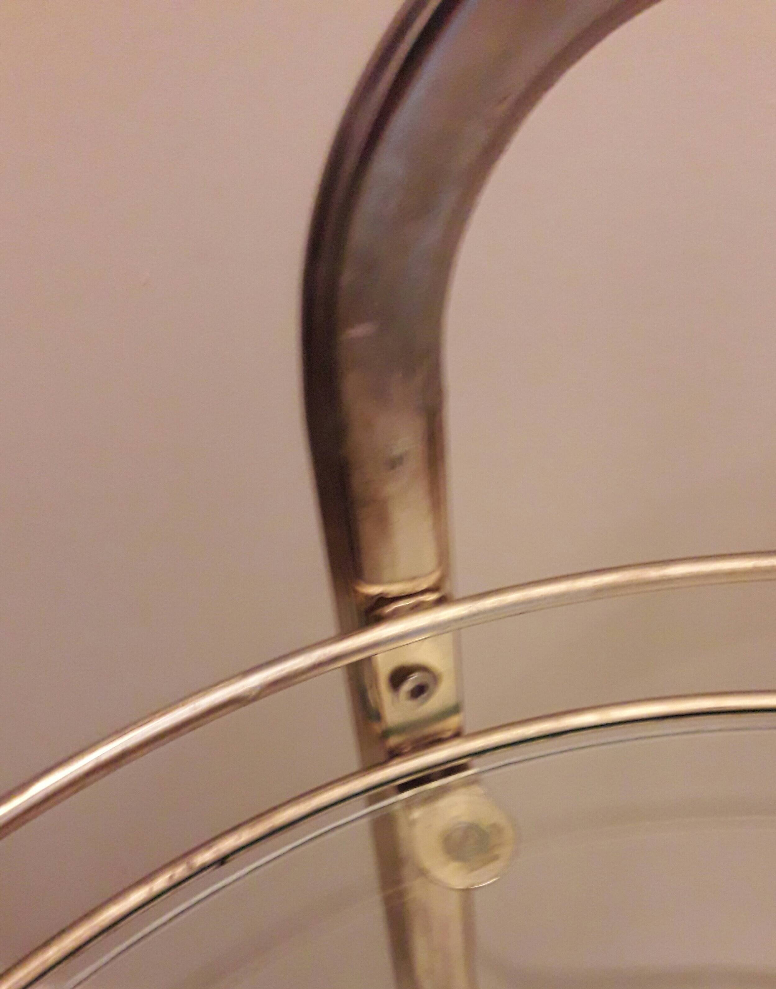 Rolling service in gilded metal and glass