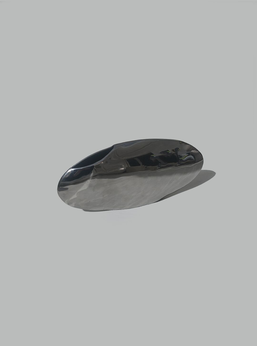 Minimalist oval steel vase