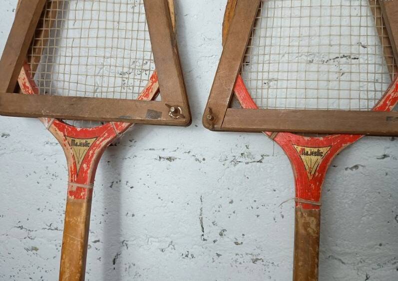 Pair of vintage Majestic tennis rackets with press.