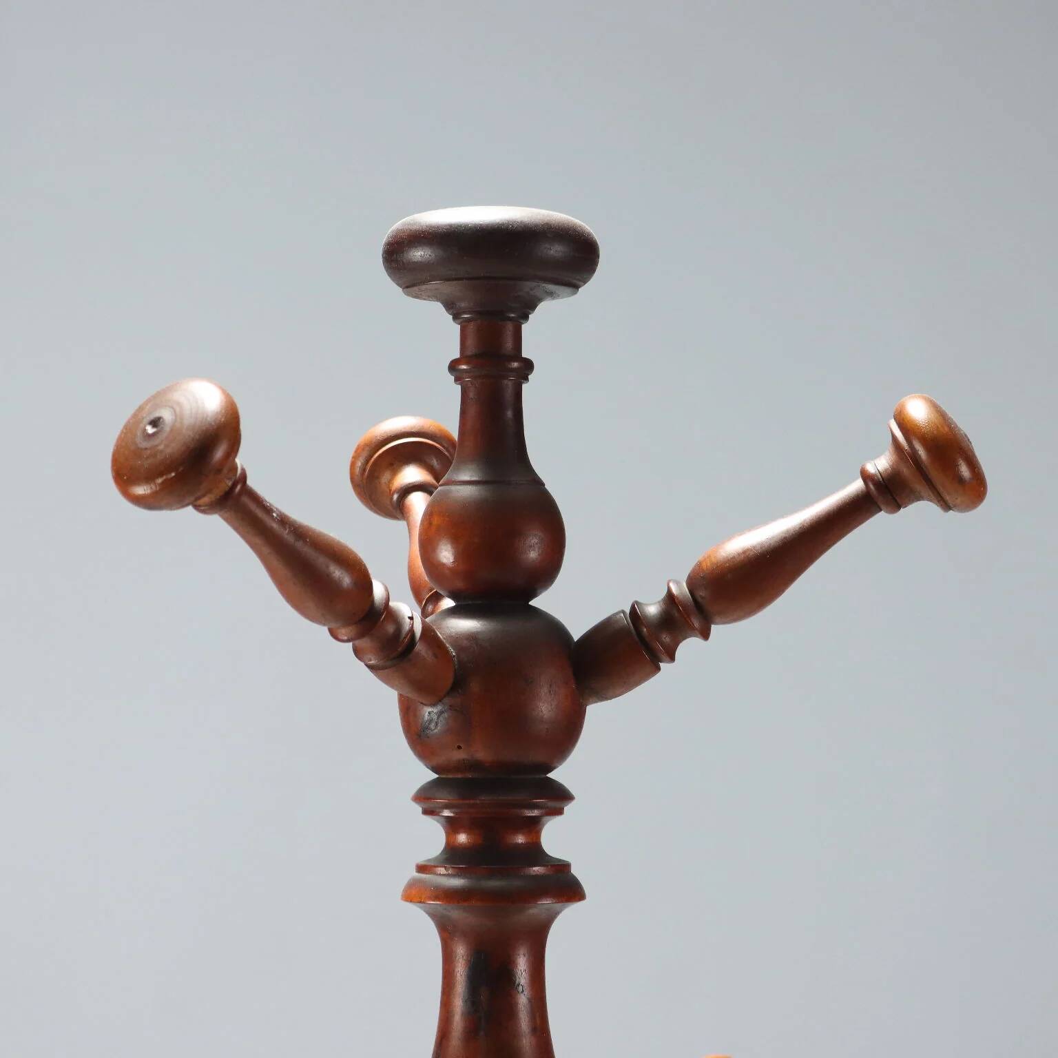 Antique coat rack in lime wood stained walnut, Italy, 19th century.