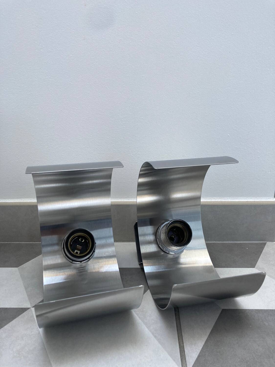 Pair of Space Age brushed metal wall lights