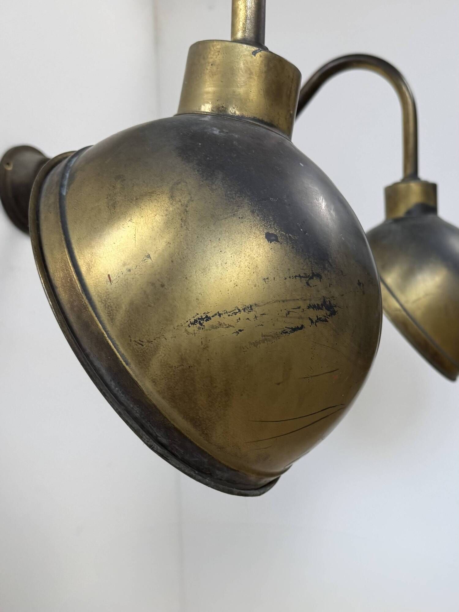 Pair of XL patinated brass wall lights, France, 1970.