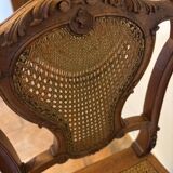 Pair of Louis XV style chairs in wood and caning.