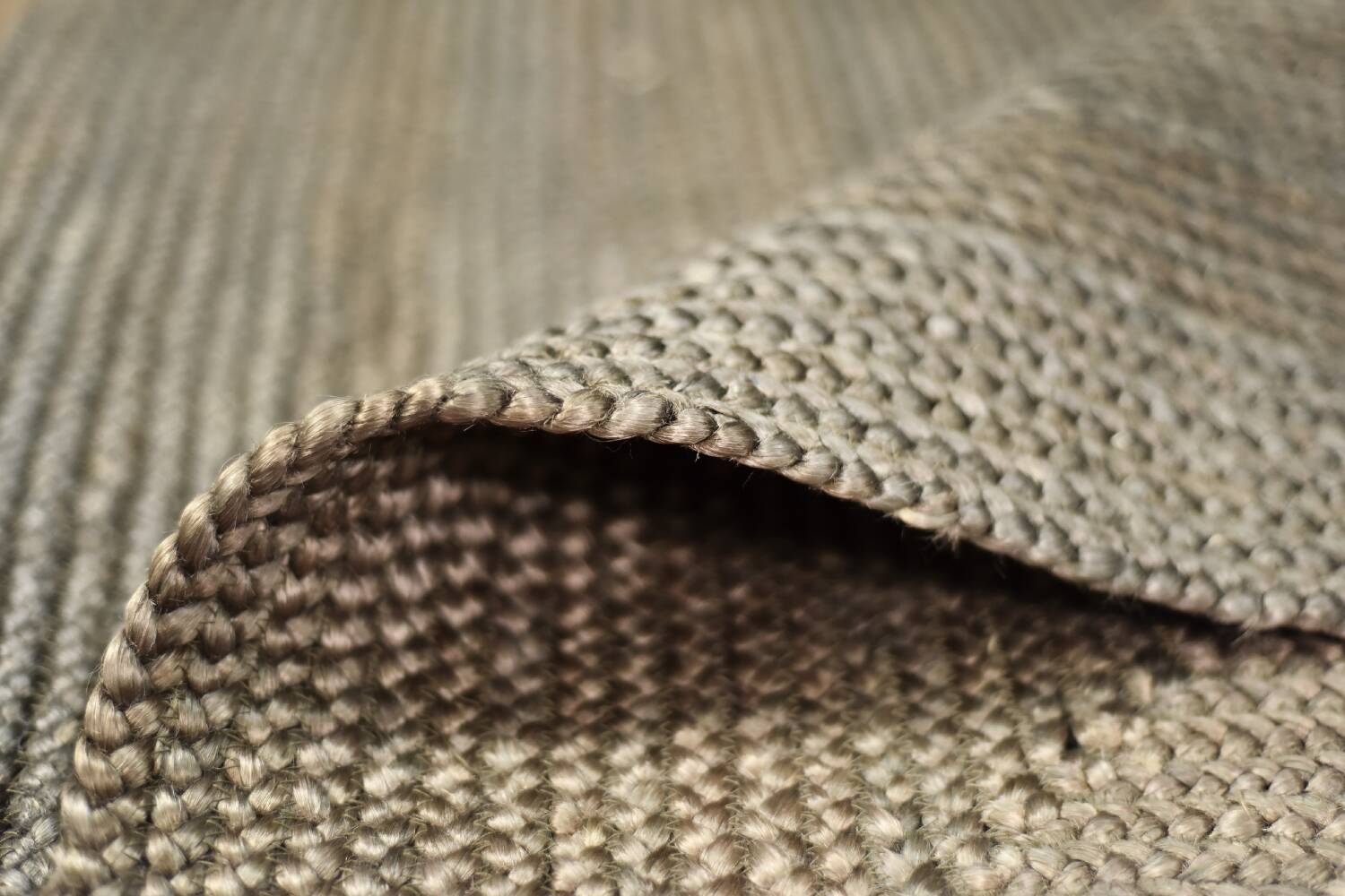 Brown flat-woven jute Indian rug, 1970.