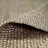 Brown flat-woven jute Indian rug, 1970.