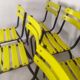 18 yellow metal bistro chairs