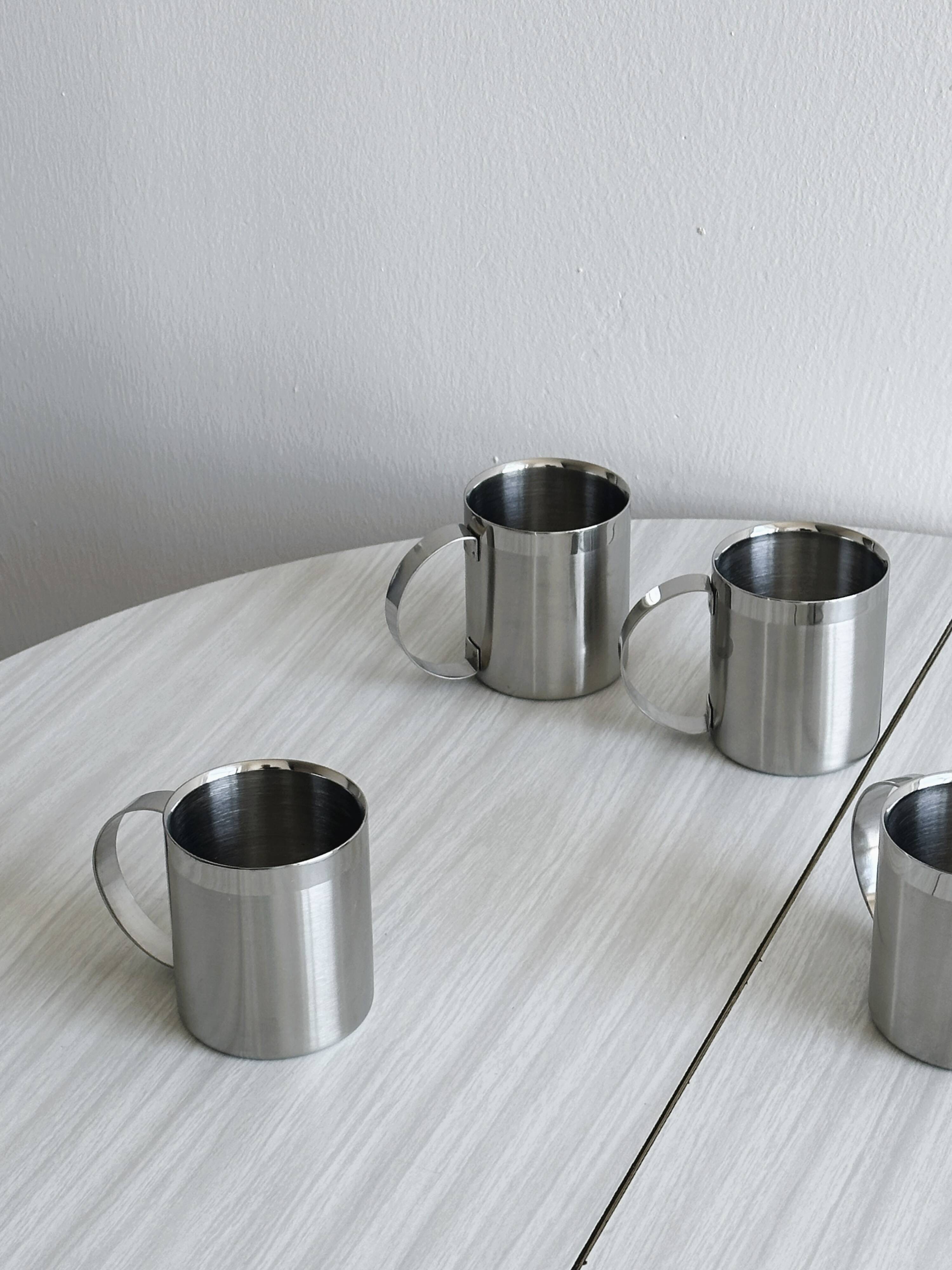 Set of 4 shiny stainless steel mugs