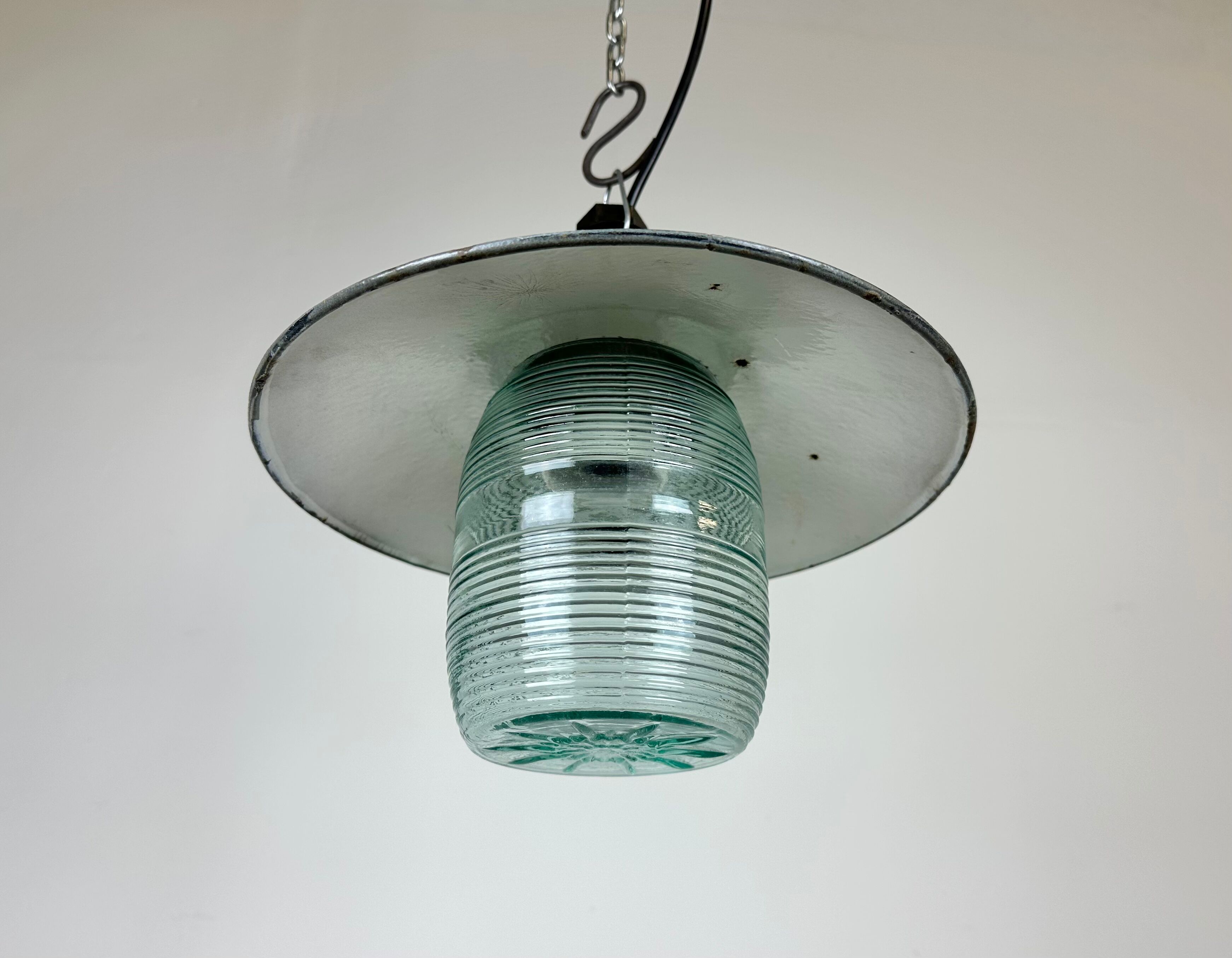 Industrial bakelite green enamel pendant light with ribbed glass, 1970s