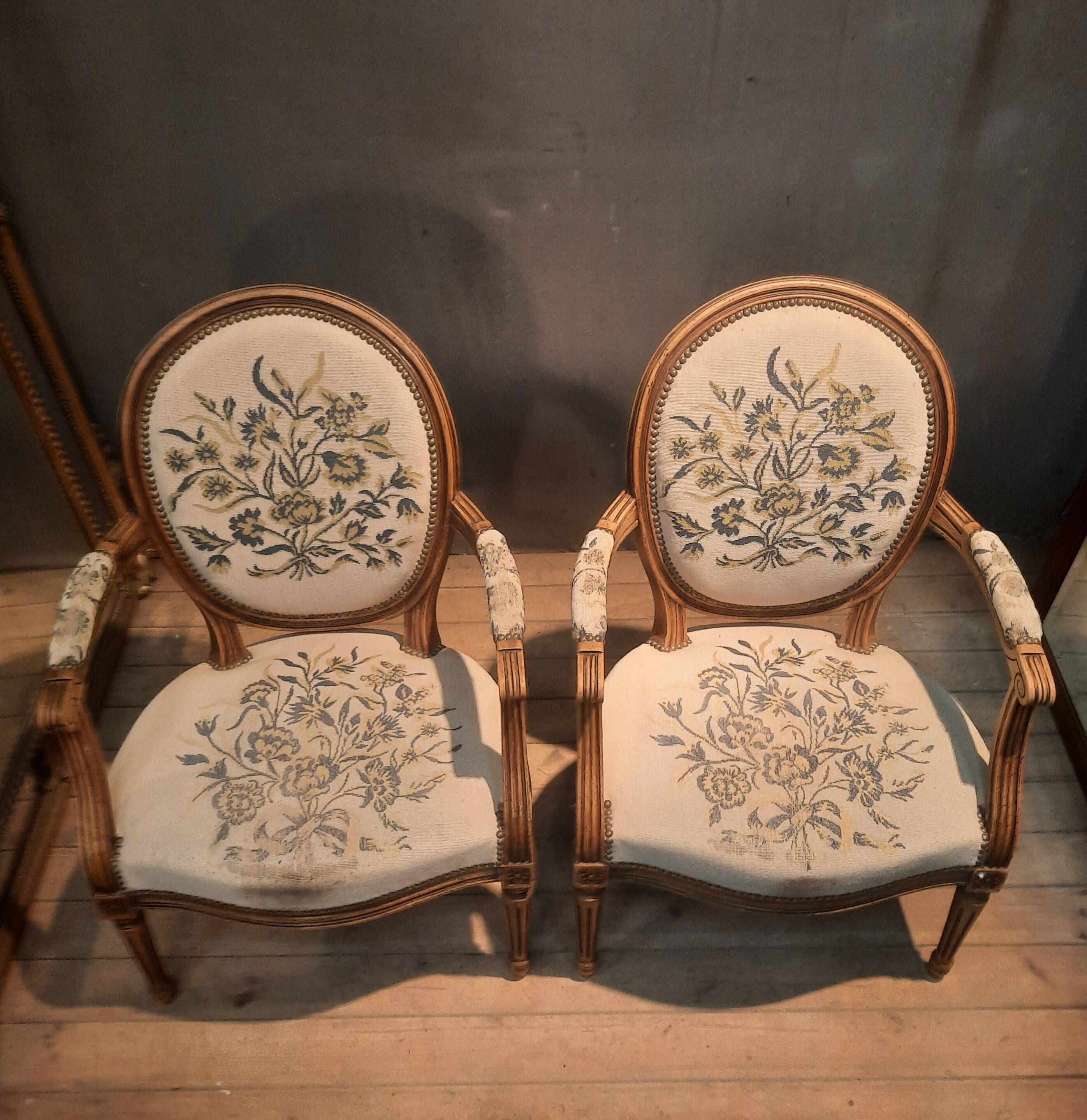 Pair of Louis XV style medallion armchairs.