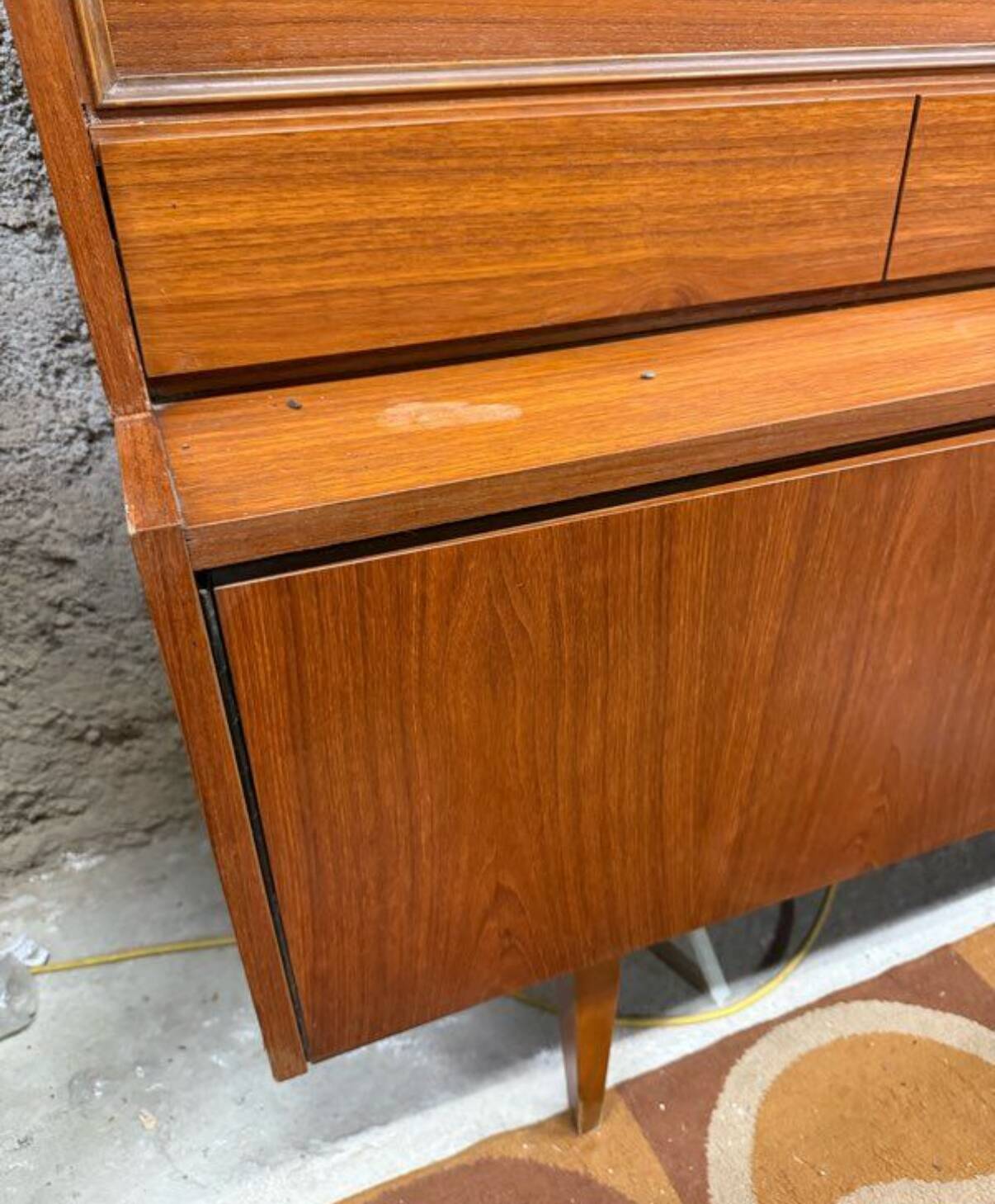 Vintage Scandinavian teak sideboard with compass feet from the 70s