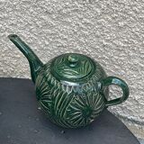 Service to the ceramic enamelled chiseled green and vintage