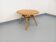 Round coffee table in vintage rattan and wood from the 1960s.