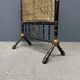 Antique black and gold faux bamboo fireplace screen