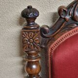 Chair known as a "chauffeuse" from the Napoléon III period, made of carved moulded wood.