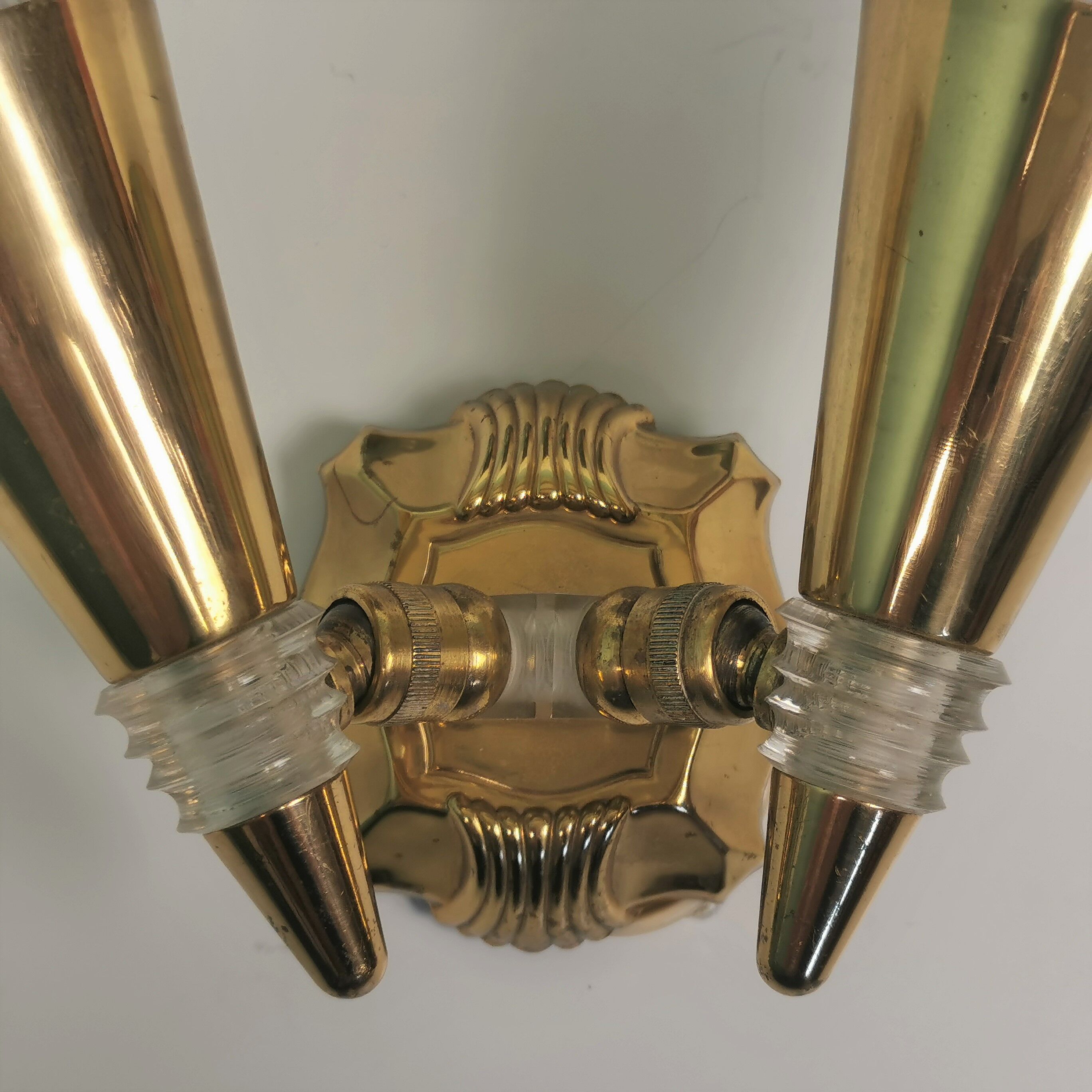 Applique double laiton