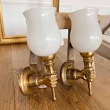 Set of 2 golden, bronze and brass torch wall lights