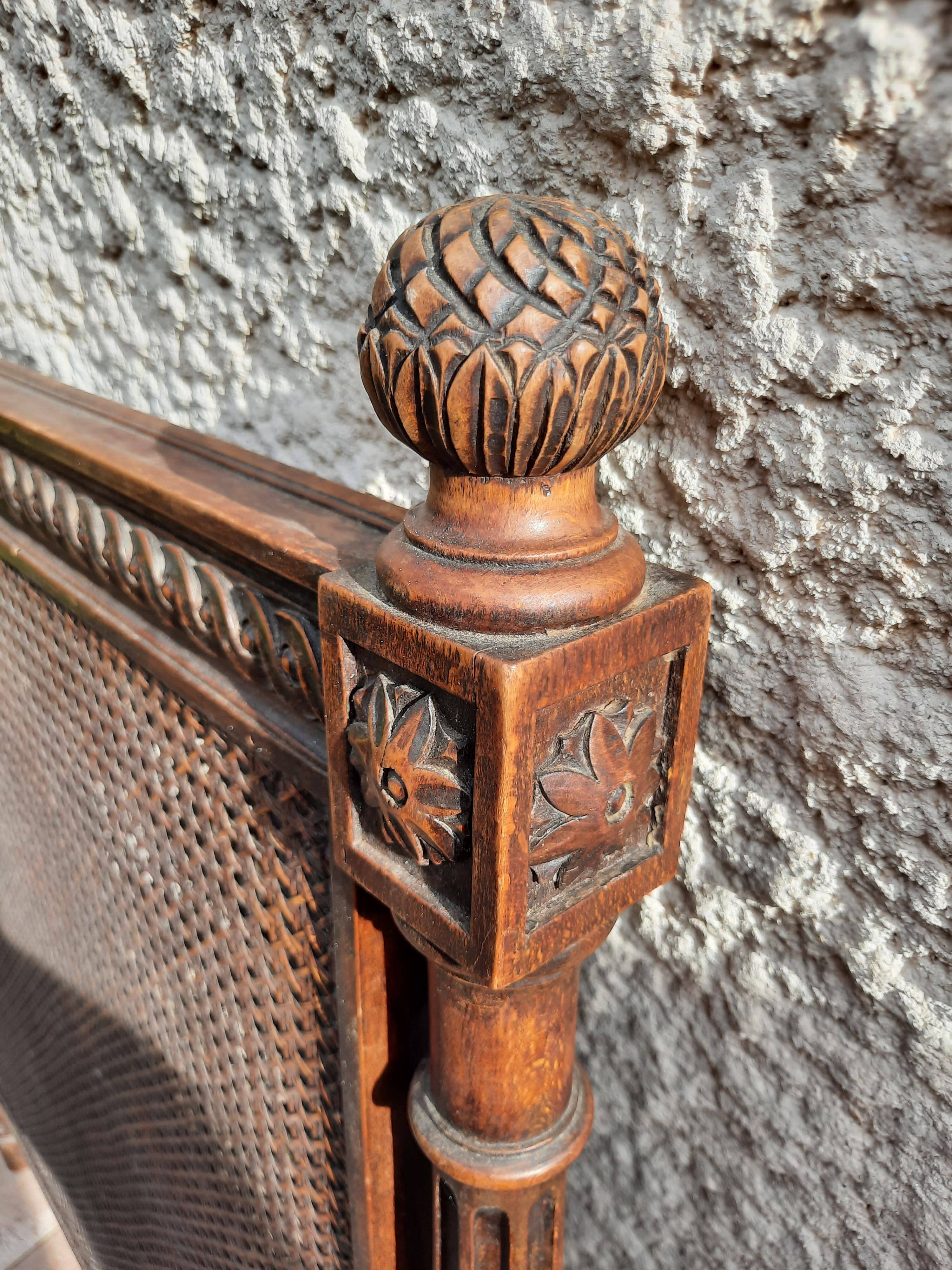 Hand-carved Louis XVI style headboards with chic vintage caning (1800s)