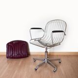 Dark red leather hairdresser's chair