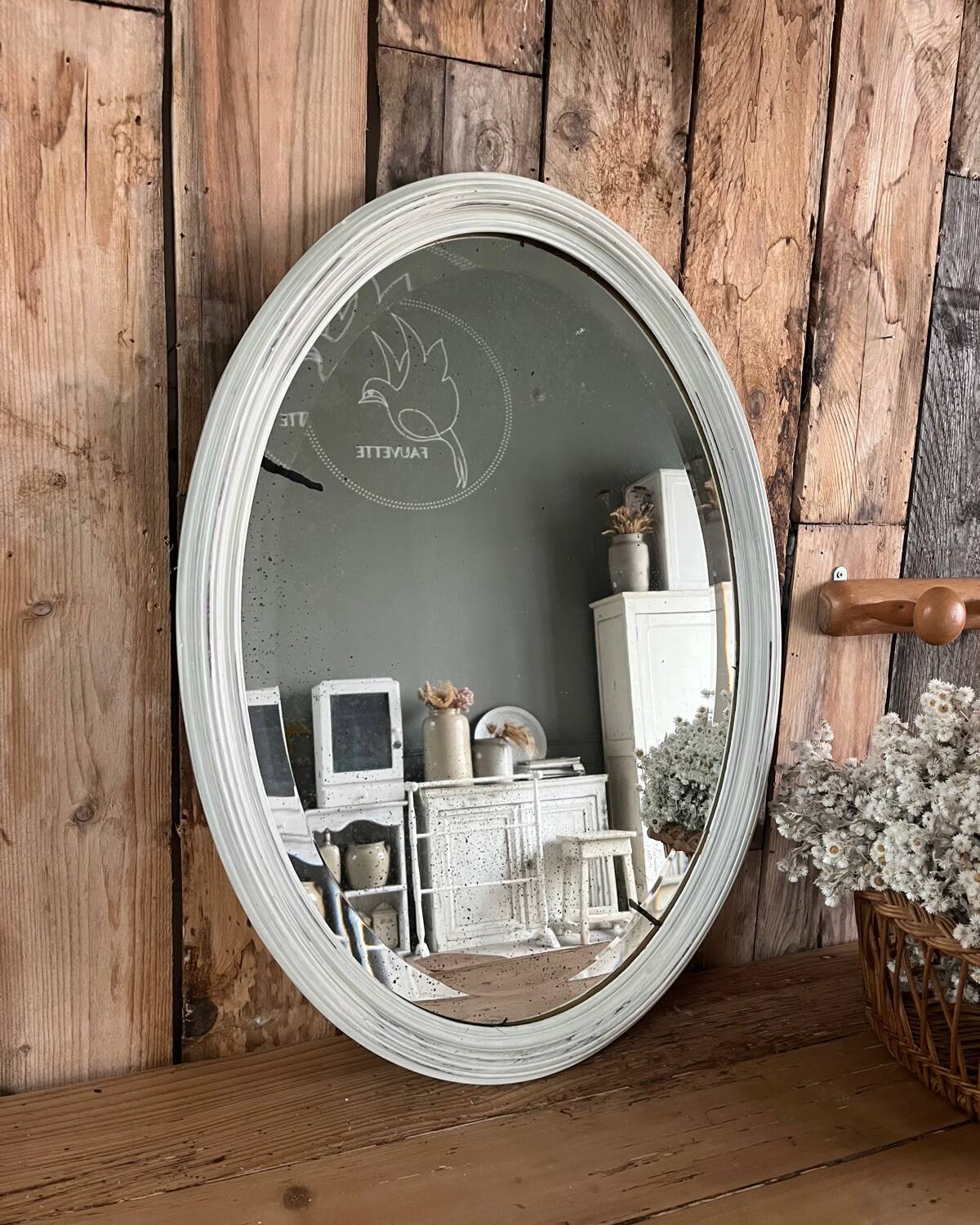 White patinated oval mirror
