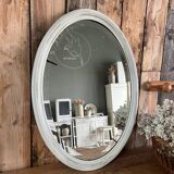White patinated oval mirror