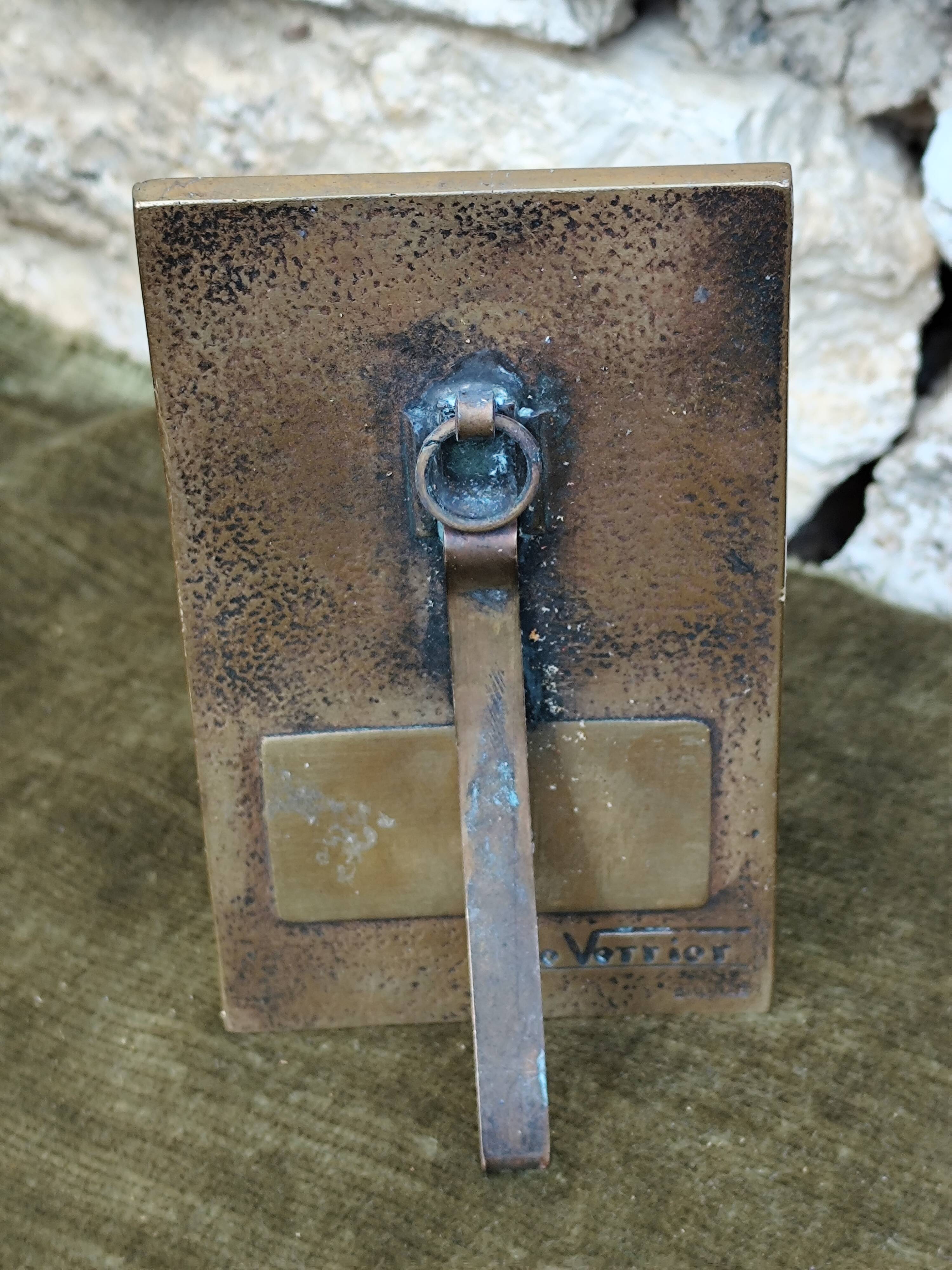 Bronze plaque of the Virgin Mary by Max Le Verrier