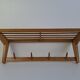 Mid-century Czechoslovak wooden wall coat rack with shelf, Uluv, 1970s