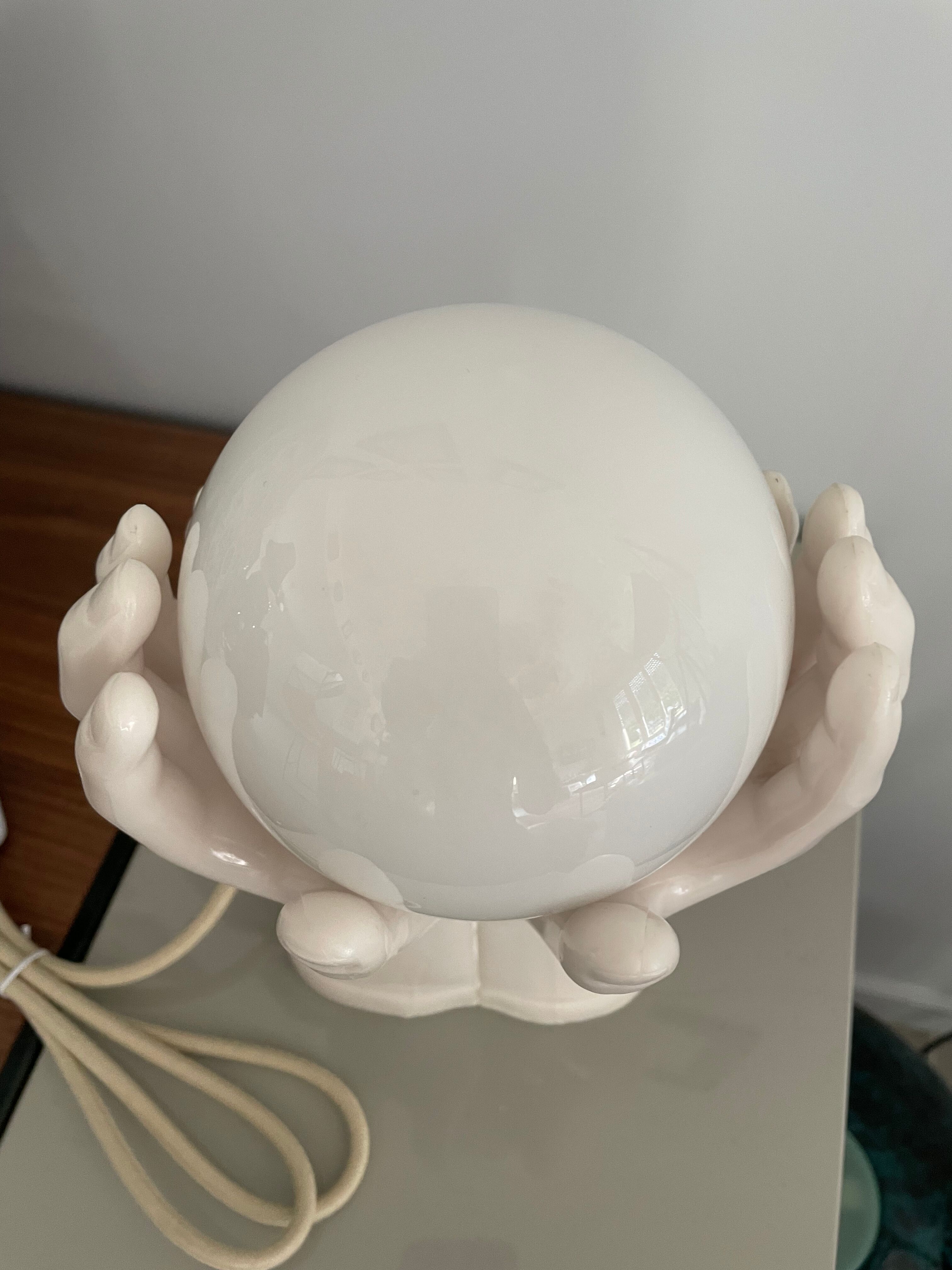 Resin hand-shaped table lamp