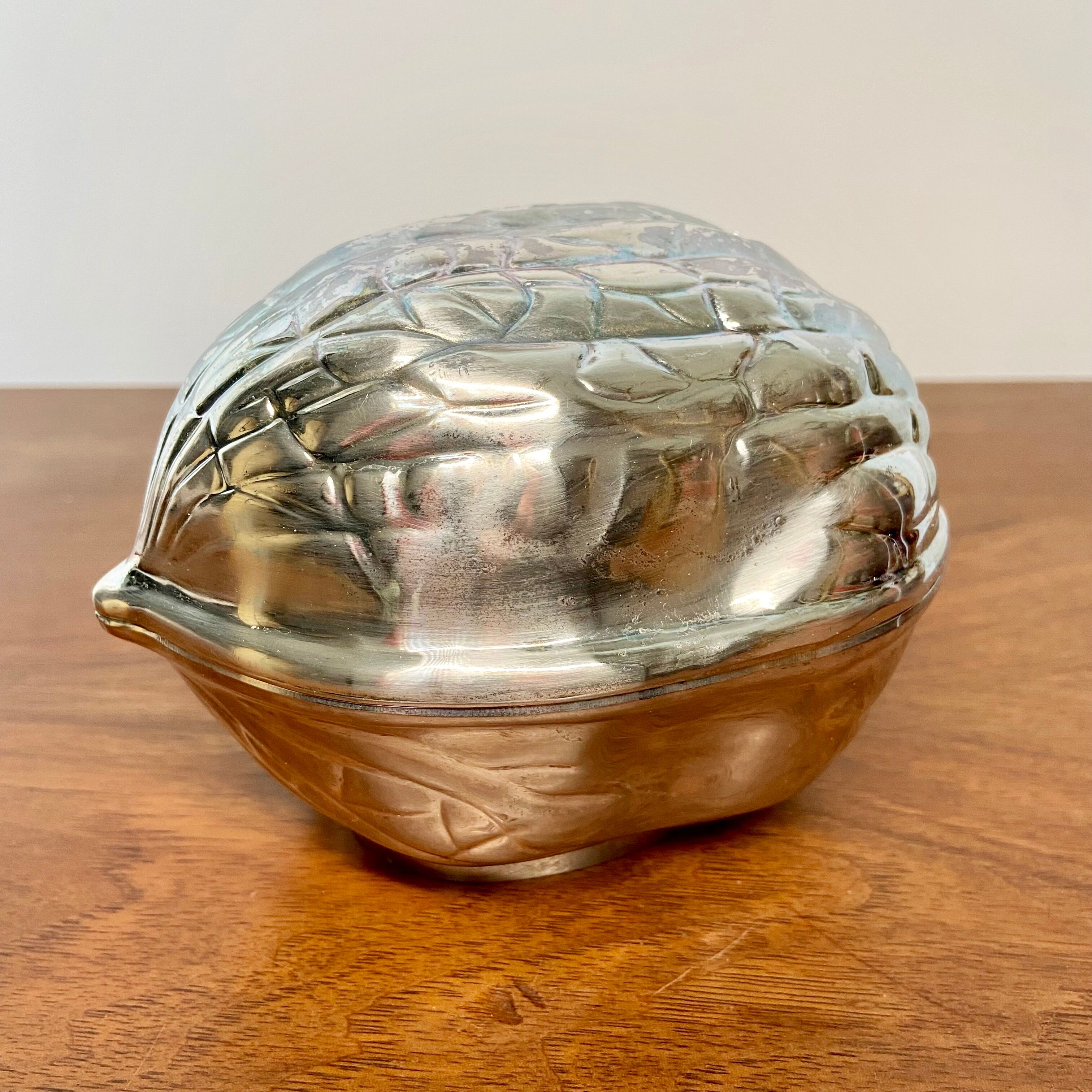 Silver metal walnut box