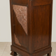 Small storage unit in solid wood and copper.