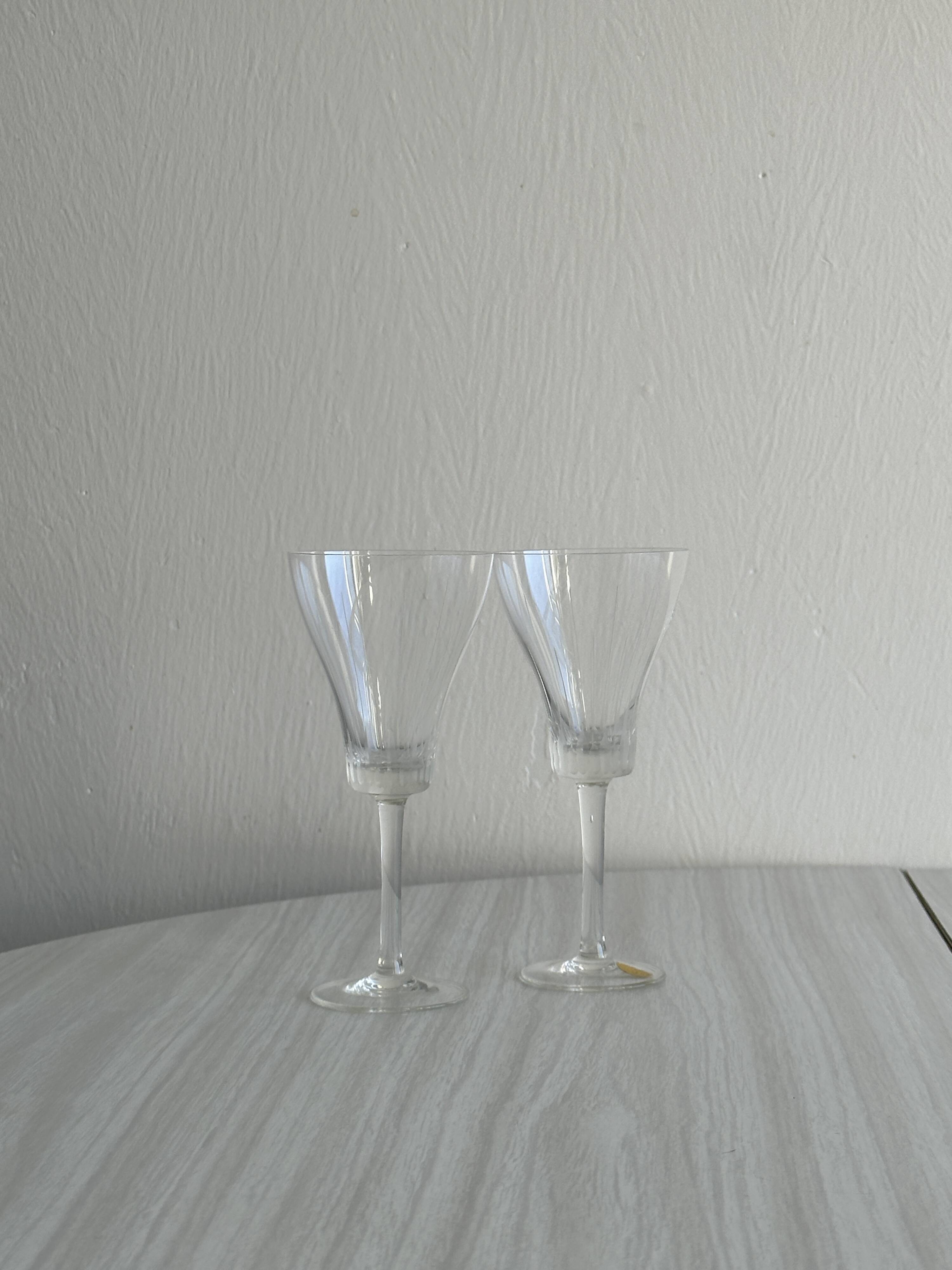 Two chiseled crystal liqueur glasses