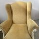 Pair of Louis XV style wing chairs in patinated beech, 20th century