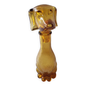 Bouteille en forme de chien en verre ambré