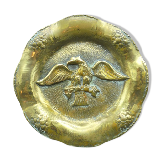 Assiette en bronze décorée d'un aigle