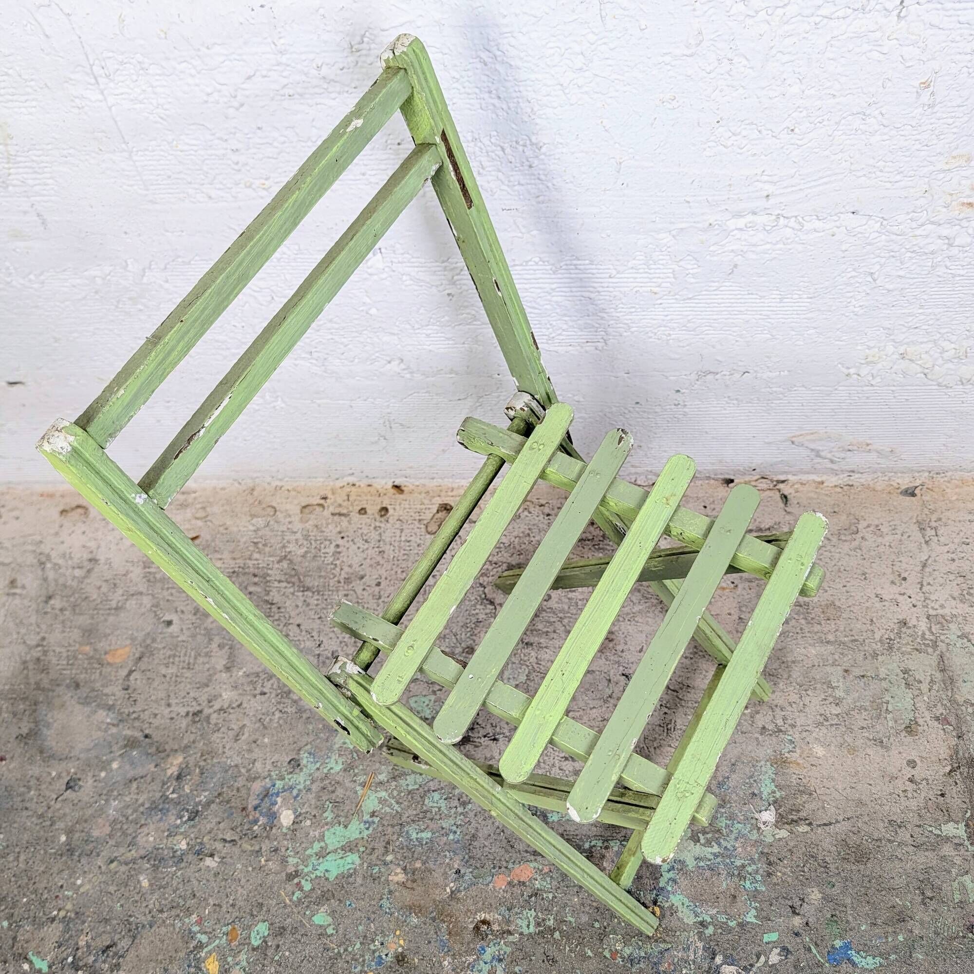 Child's folding chair in patinated green wood