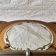Art Deco wooden wall coat rack with round central mirror