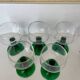 5 two-coloured green stemmed glasses with conical stems Roemer